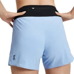 On Running On 5Inch Running Shorts Women - Stratosphere & Black 9 On Running On 5Inch Running Shorts Women - Stratosphere & Black -On Running Shop on 5inch running shorts women stratosphere black 5 1443223